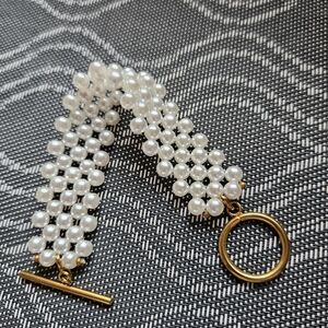 Multi-Strand Faux Pearl Bracelet with Gold Toggle Closure - White
